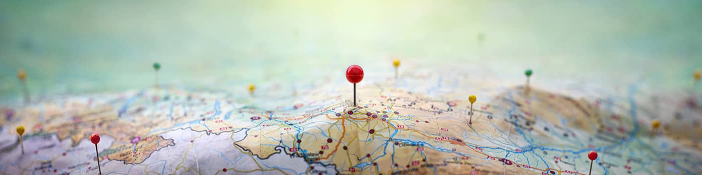 close up of pins on a map