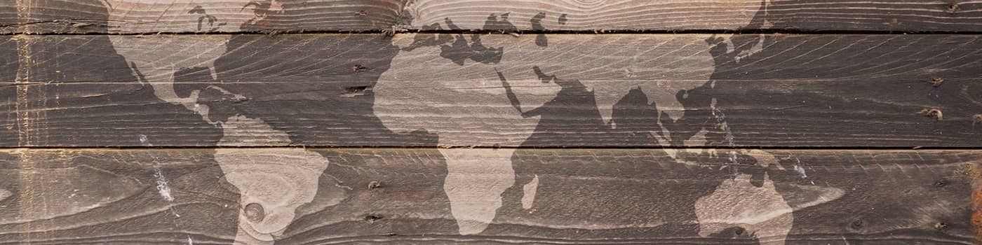 a world map on wood planks